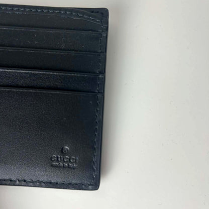 Portfel Gucci Signature Bi-Fold — wnętrze z logo Gucci